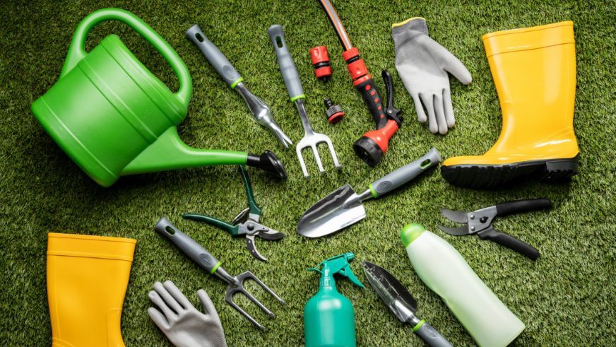 gardening tools displayed on turf grass