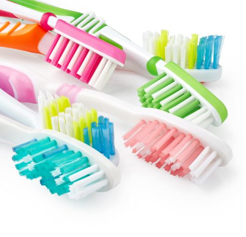 isolated toothbrushes