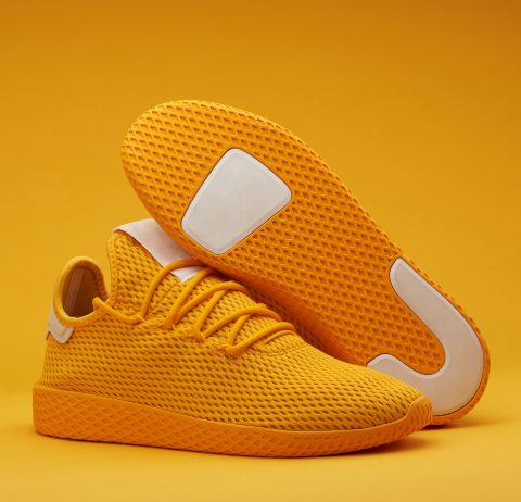 isolated orange baskeball shoes