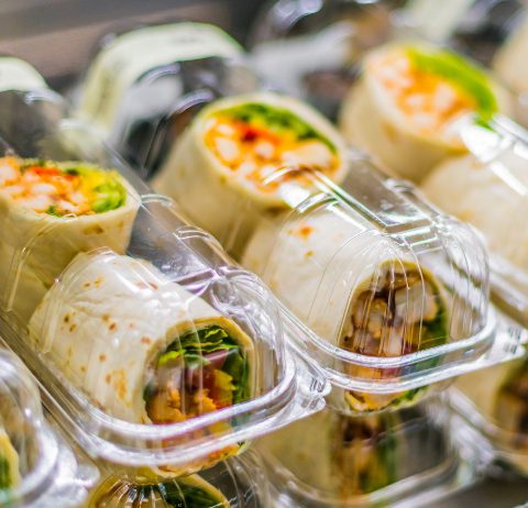 chicken wraps packaged in plastic additive containers