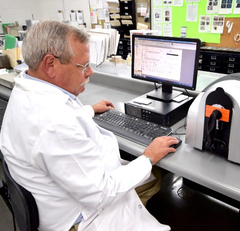 primex corporate team member working in lab