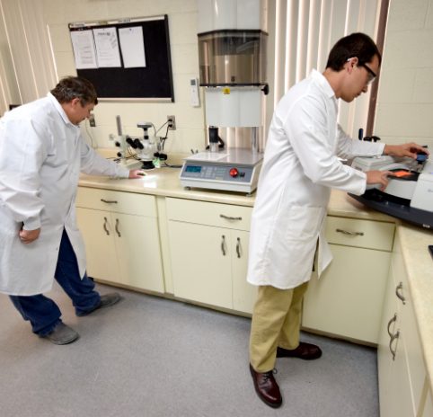 primex employees in the lab testing products