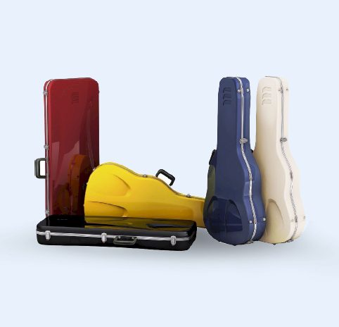 various colored guitar cases standing up and laying down