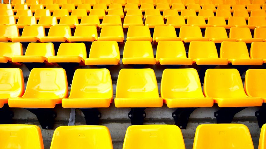 rows of yellow stadium seating