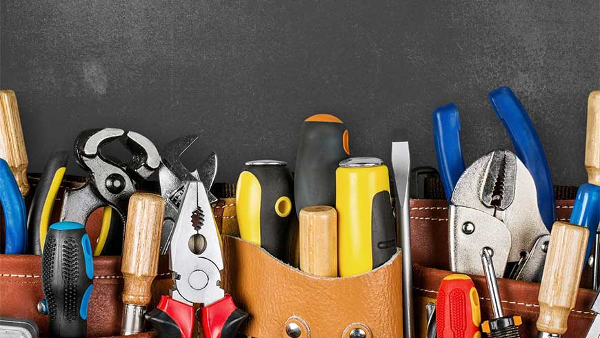 colorful toolset displayed on black table top