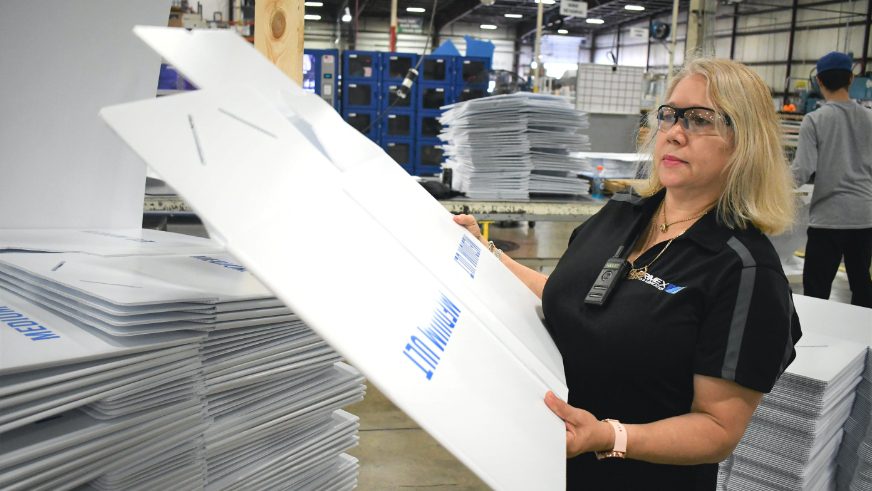 woman holding primex box