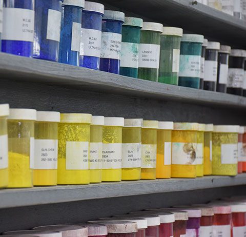 color containers on shelf