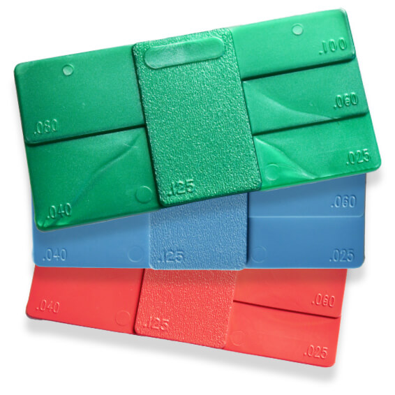 Plastic color swatches – green, blue, and red