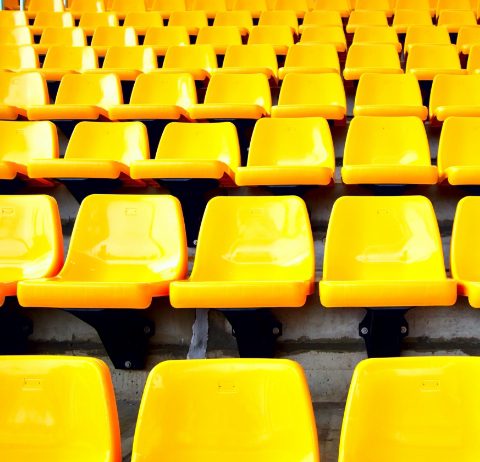rows of yellow stadium seating